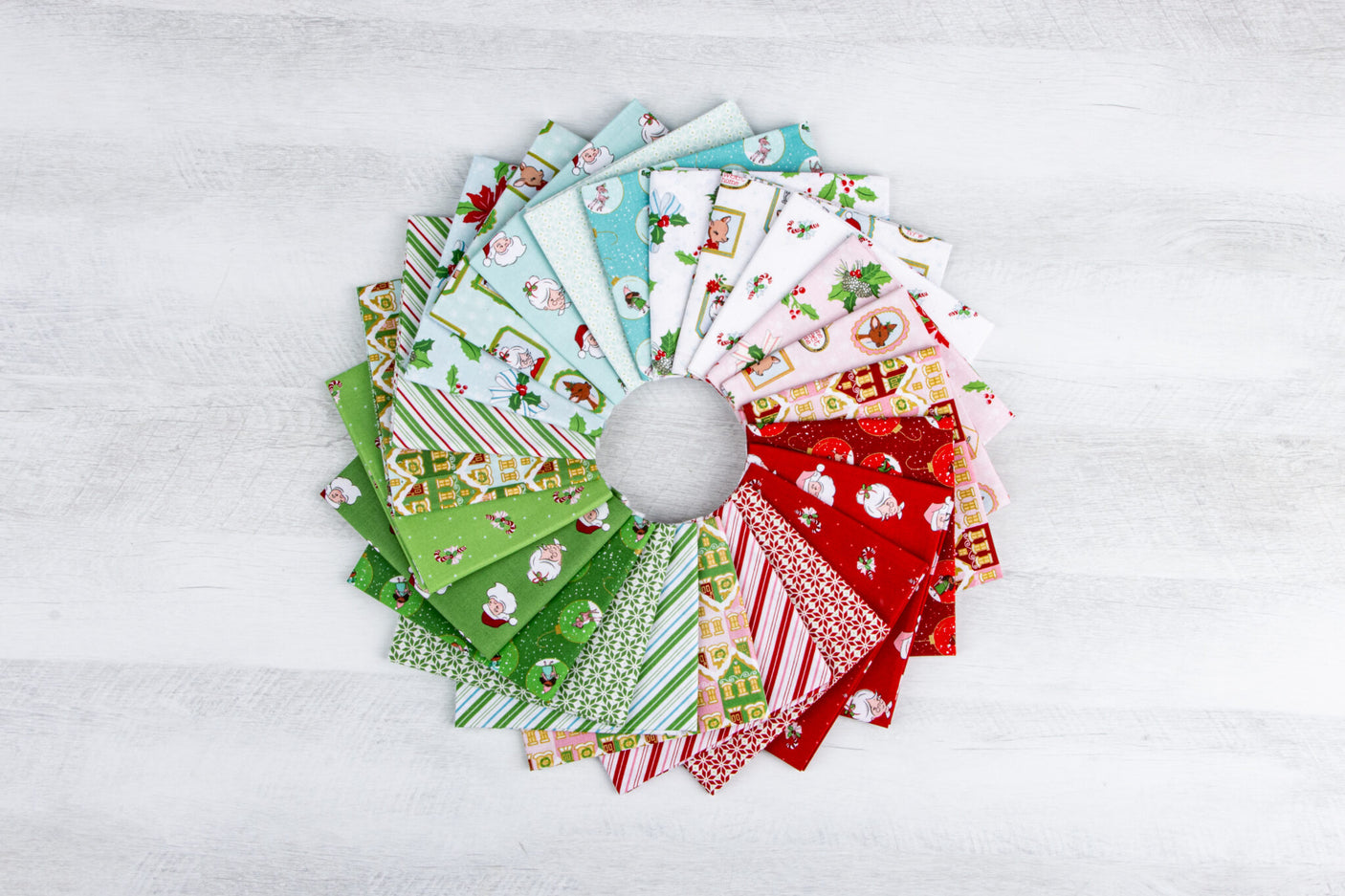 Collection of colorful fabric swatches arranged in a circular pattern on a white background