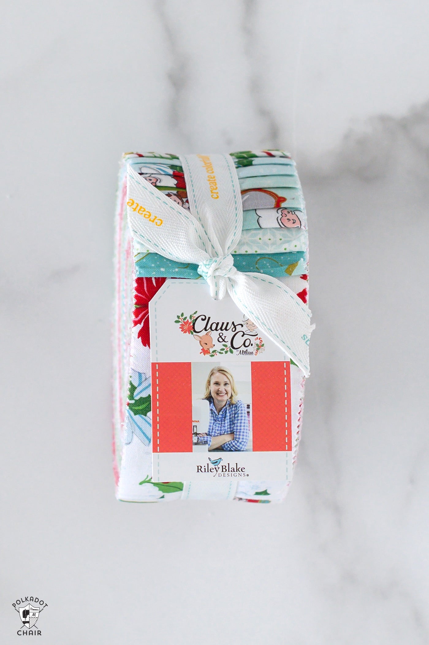 Fabric roll with a visible brand tag on a gray background