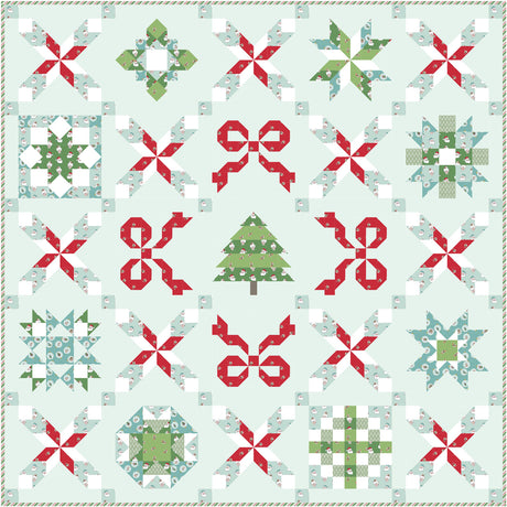 Quilt with Christmas-themed patterns including stars, bows, and trees on a light blue background.