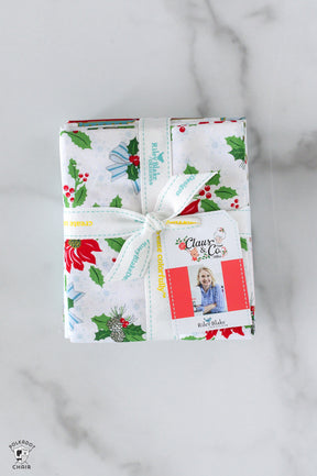 Packaged product with Christmas-themed design on a marble surface