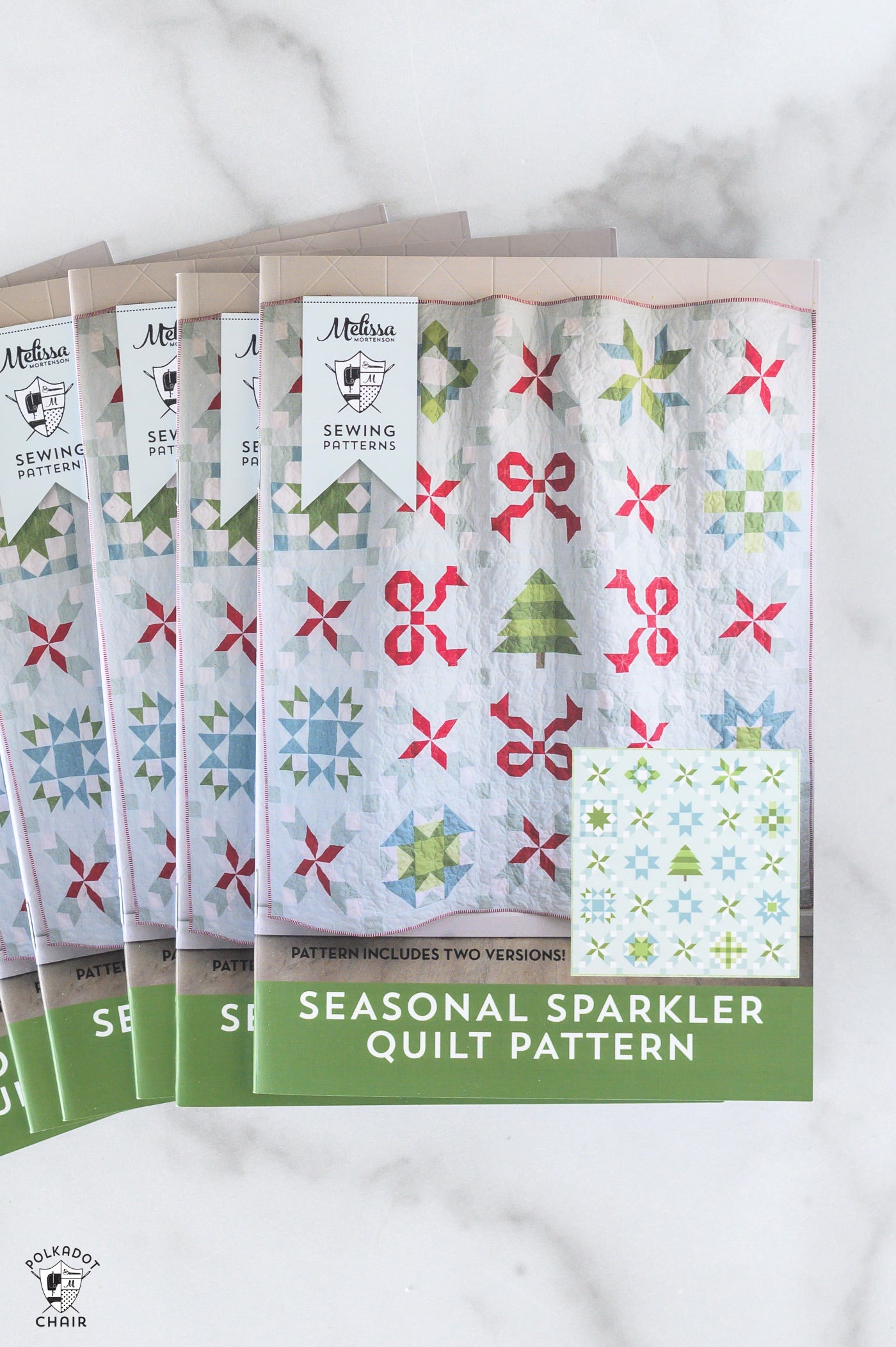 Seasonal Sparkler Quilt pattern books on a white background